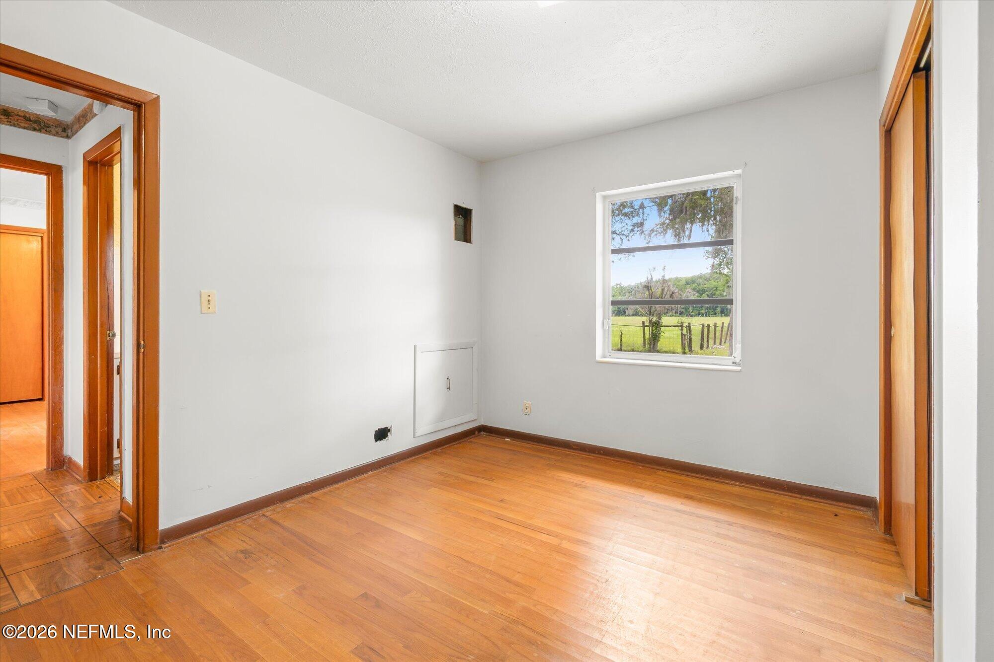 786 West River Road Palatka, FL 32177 - Photo 23 of 53 an empty room with windows