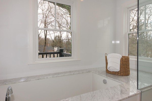 180 Pine Ridge Road Newton, MA 02468 - Photo 14 of 30 a bathroom with a bathtub and window