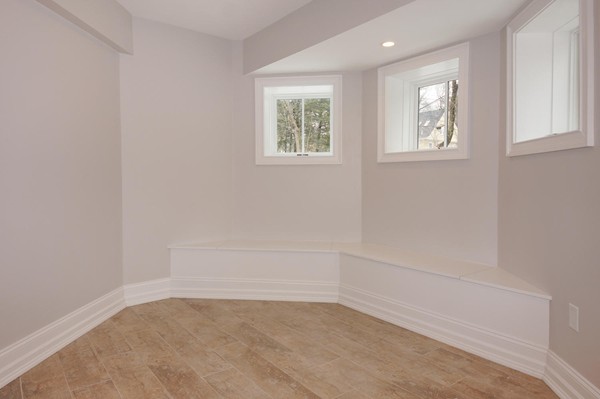 180 Pine Ridge Road Newton, MA 02468 - Photo 26 of 30 an empty room with windows