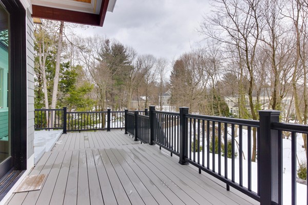 180 Pine Ridge Road Newton, MA 02468 - Photo 29 of 30 a balcony with wooden floor and fence