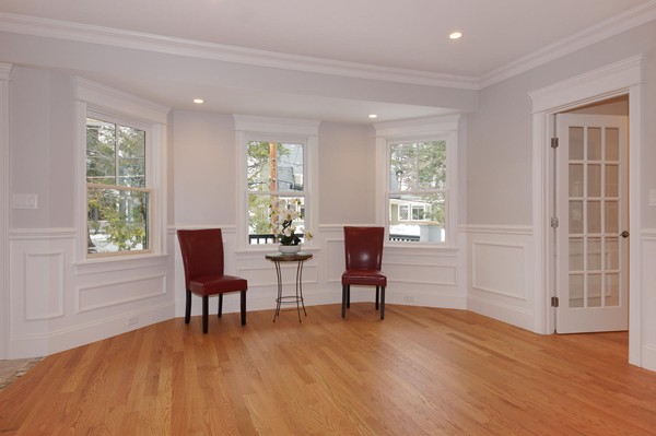 180 Pine Ridge Road Newton, MA 02468 - Photo 9 of 30 a living room with furniture and a wooden floor