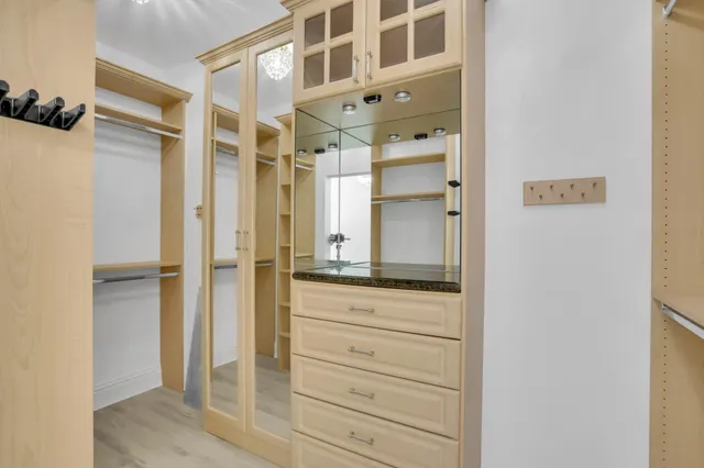 a bathroom with a shower and a mirror