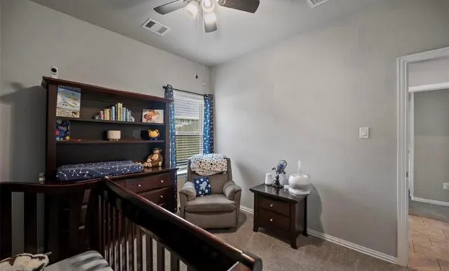 a room with furniture and musical instruments