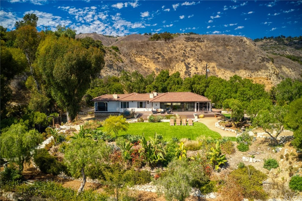 1 West Pomegranate Road Rancho Palos Verdes, CA 90275 - Photo 1 of 1 a view of a house with a yard
