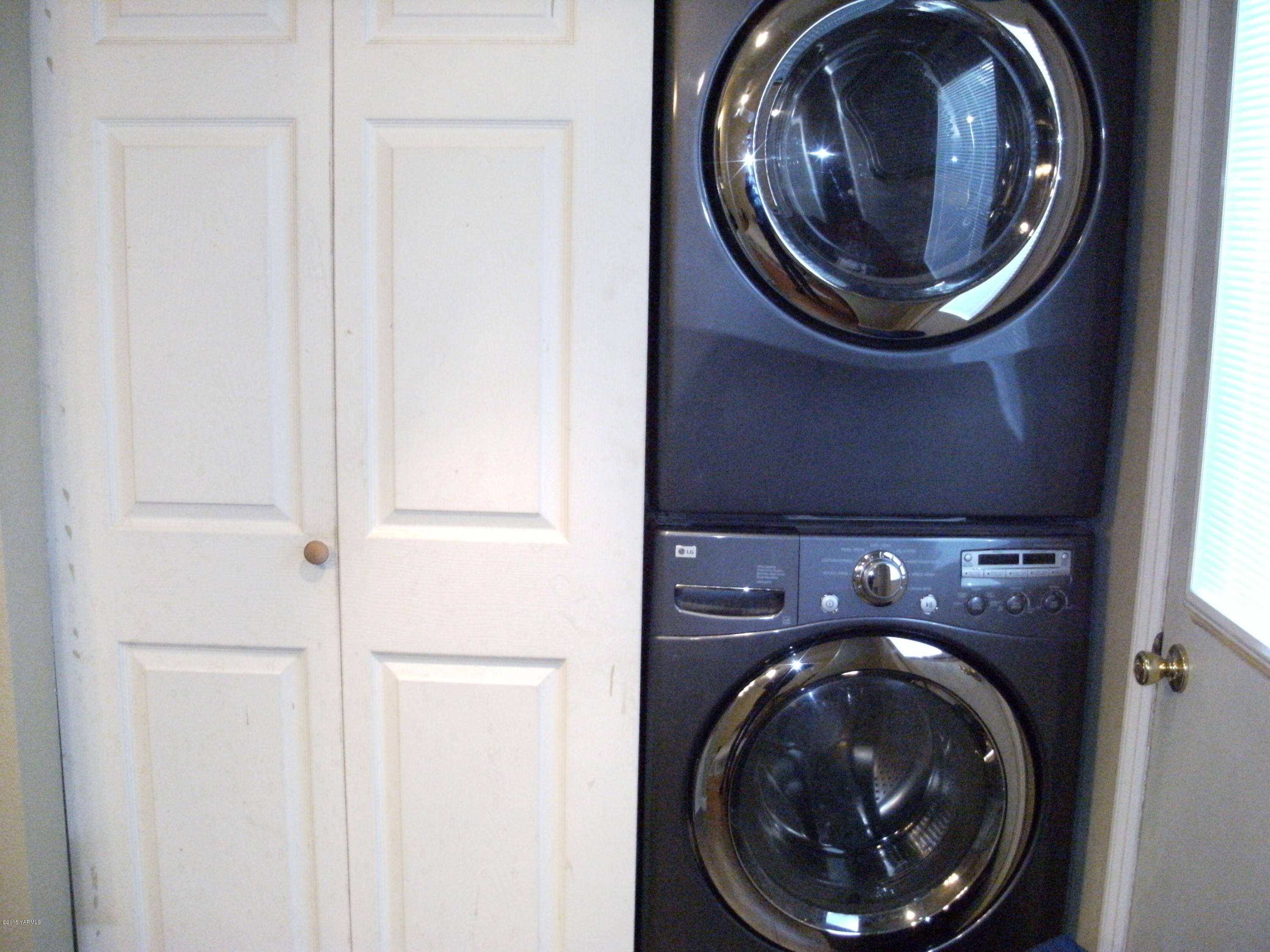 1180 Woodworth Road Grandview, WA 98930 - Photo 15 of 26 a close up view of washer and dryer