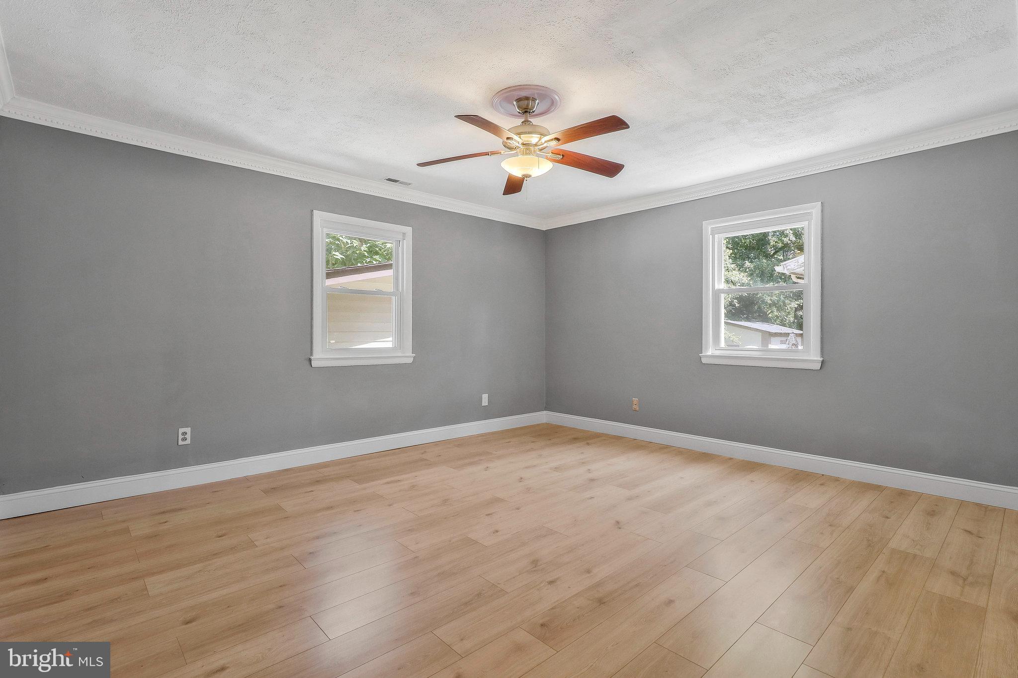 9600 Woodland Avenue Lanham, MD 20706 - Photo 21 of 41 a view of an empty room with a window