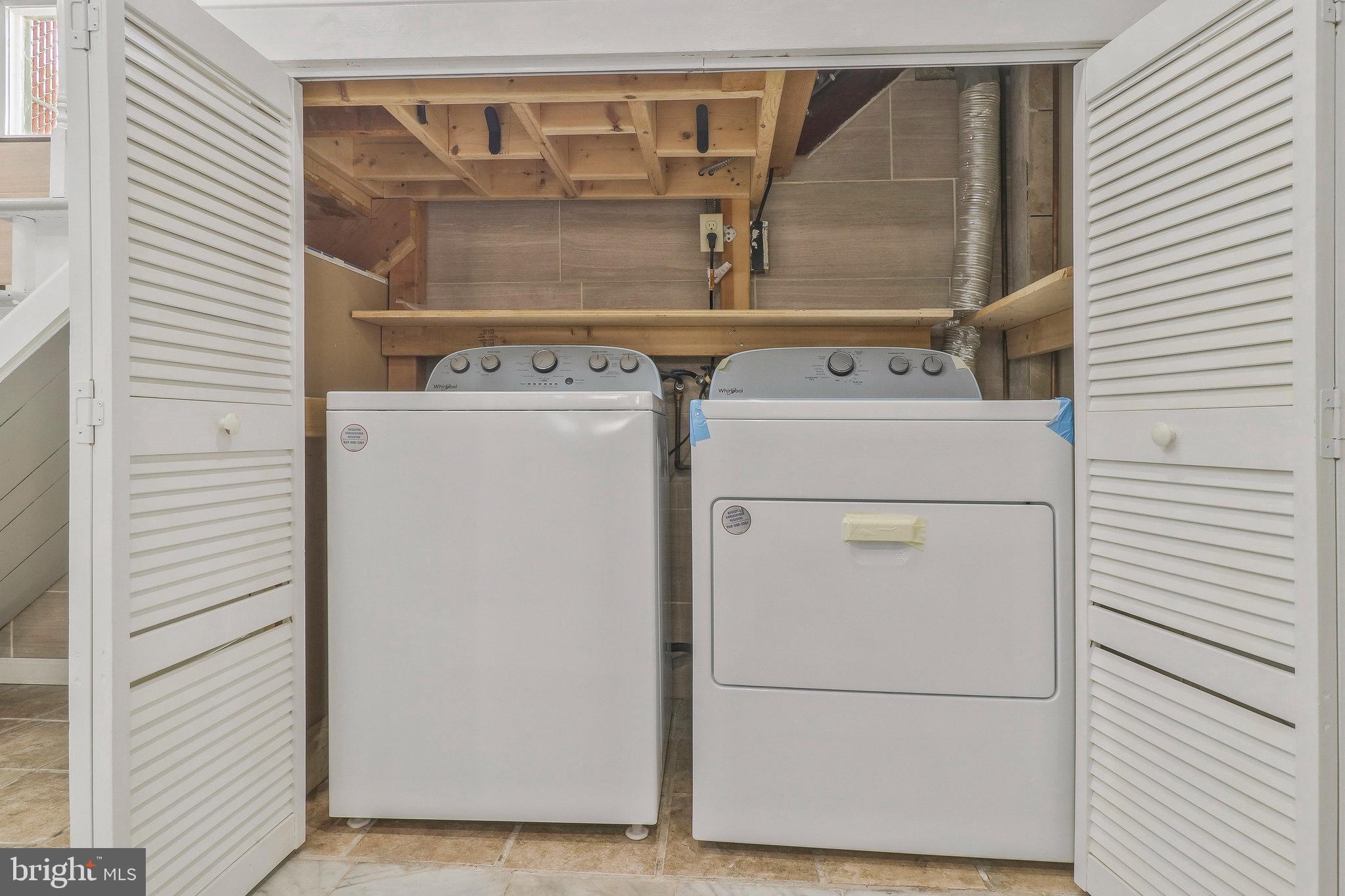 9600 Woodland Avenue Lanham, MD 20706 - Photo 24 of 41 a utility room with dryer and washer