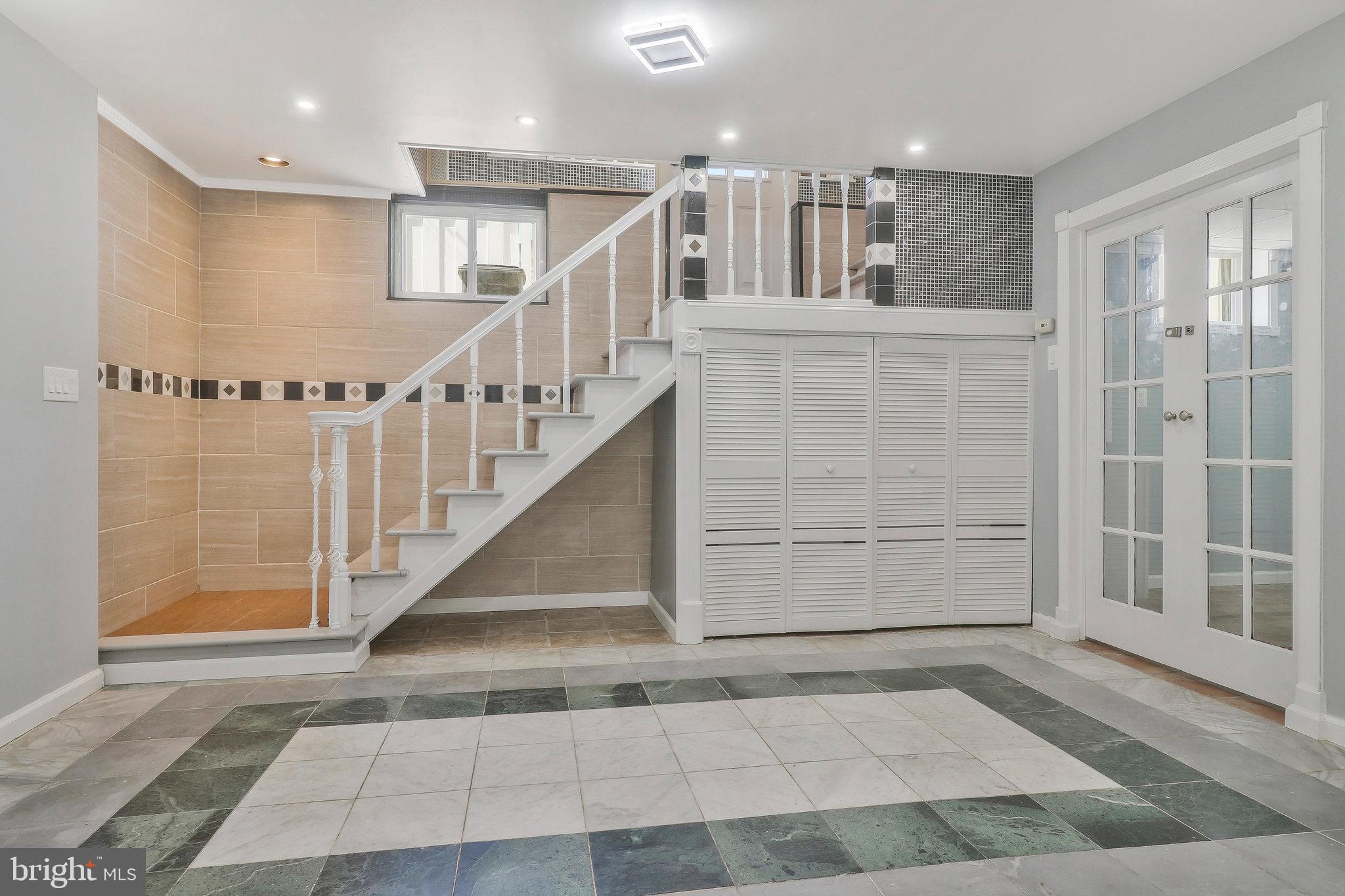 9600 Woodland Avenue Lanham, MD 20706 - Photo 29 of 41 a view of entryway and hall with a front door