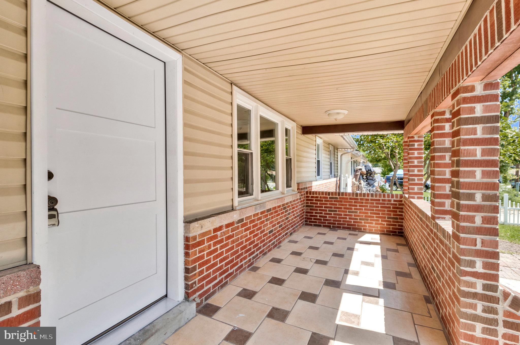 9600 Woodland Avenue Lanham, MD 20706 - Photo 3 of 41 a view of a entryway