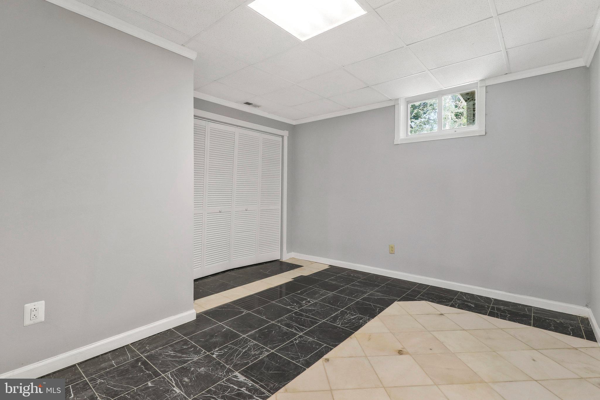 9600 Woodland Avenue Lanham, MD 20706 - Photo 33 of 41 a view of an empty room