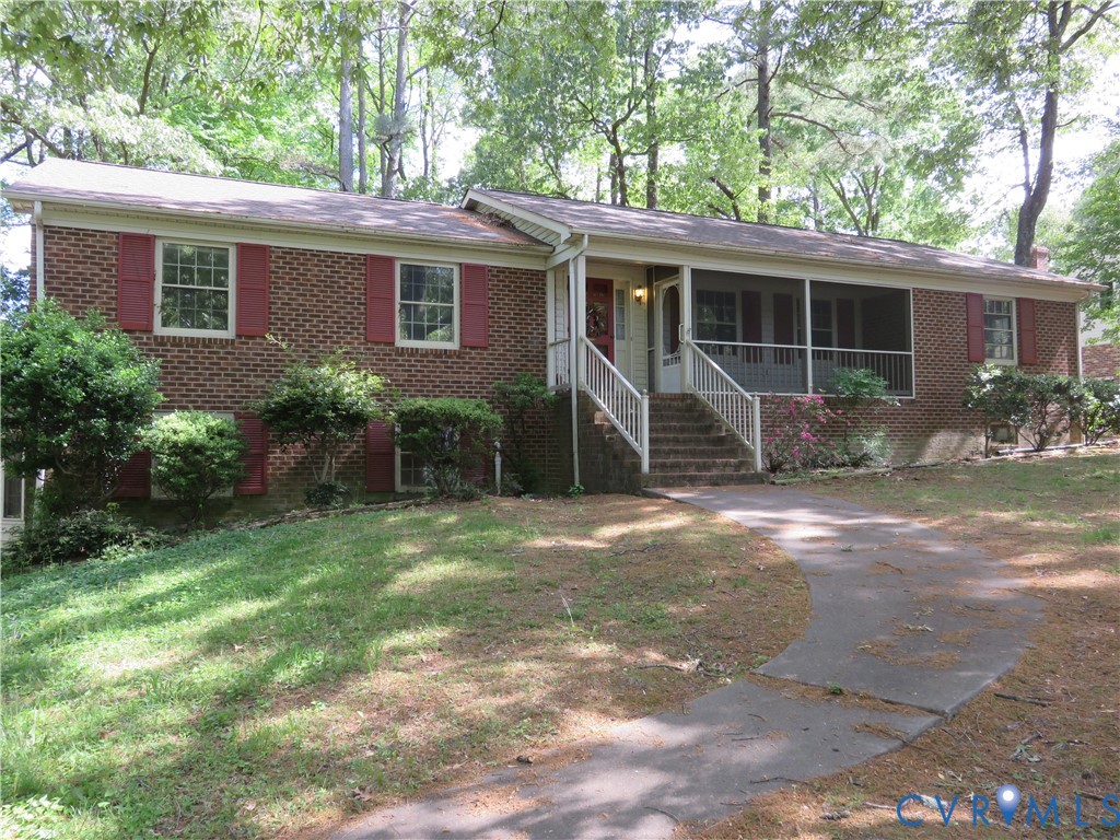 8379 Quailfield Road Mechanicsville, VA 23116 - Photo 2 of 56 a front view of a house with patio