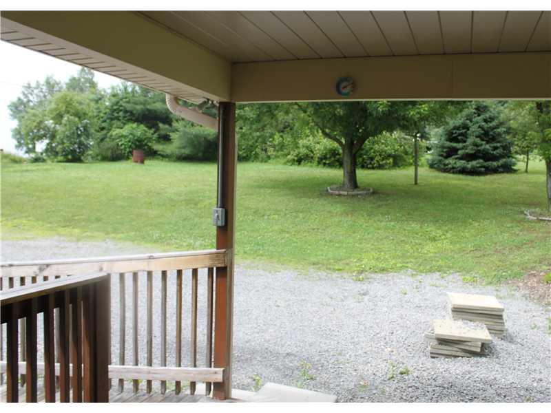 208 Pflugh Road Butler, PA 16001 - Photo 15 of 19 Patio/Deck. Back- Covered deck