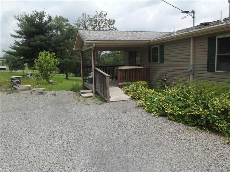 208 Pflugh Road Butler, PA 16001 - Photo 19 of 19 Exterior Back. Upper driveway with easy access to the rear porch entrance.