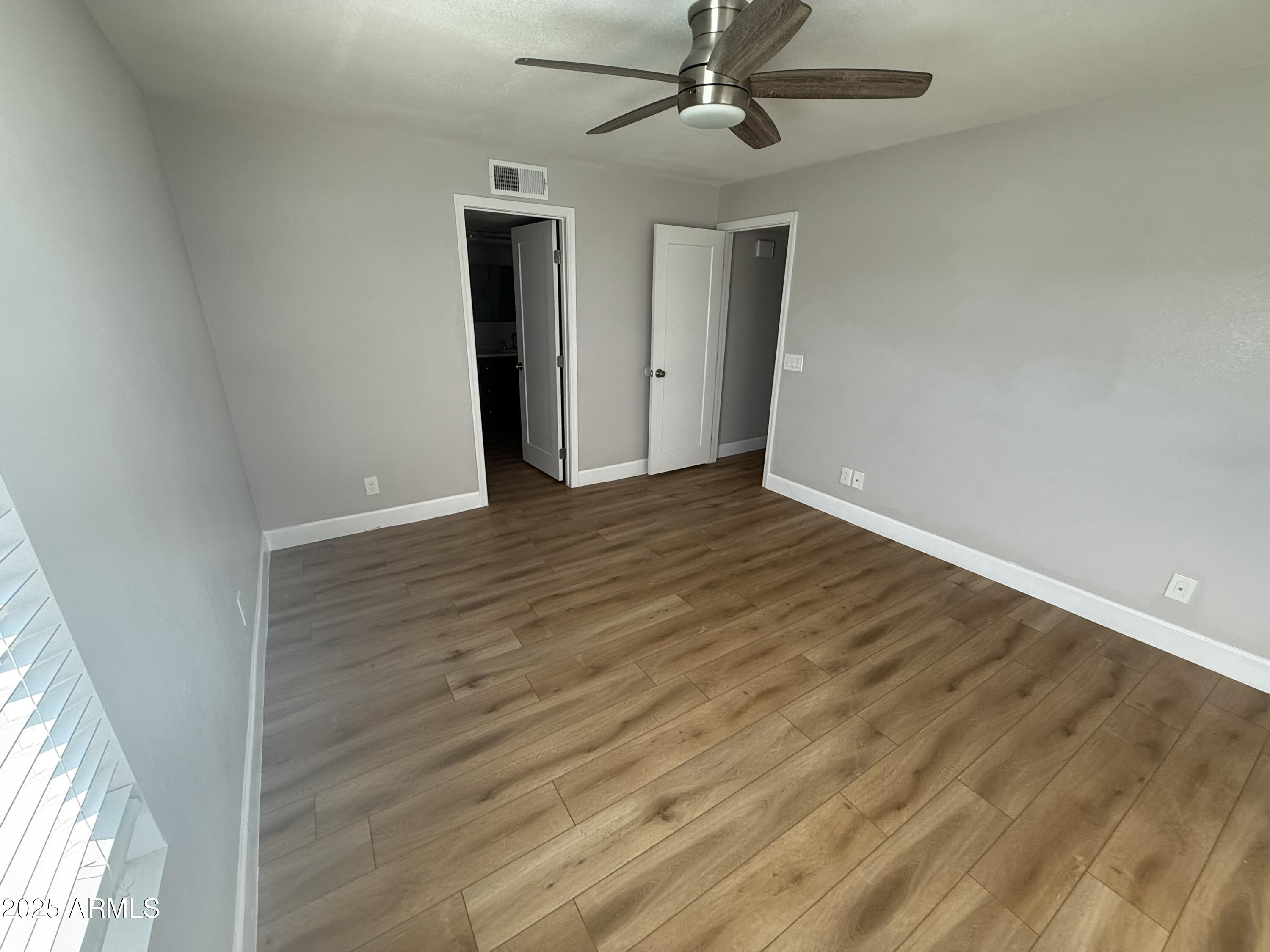 8801 North 8th Street, Unit 203 Phoenix, AZ 85020 - Photo 17 of 29 a view of an empty room with a window