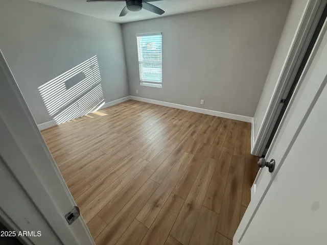 a bathroom with a sink a mirror and a toilet
