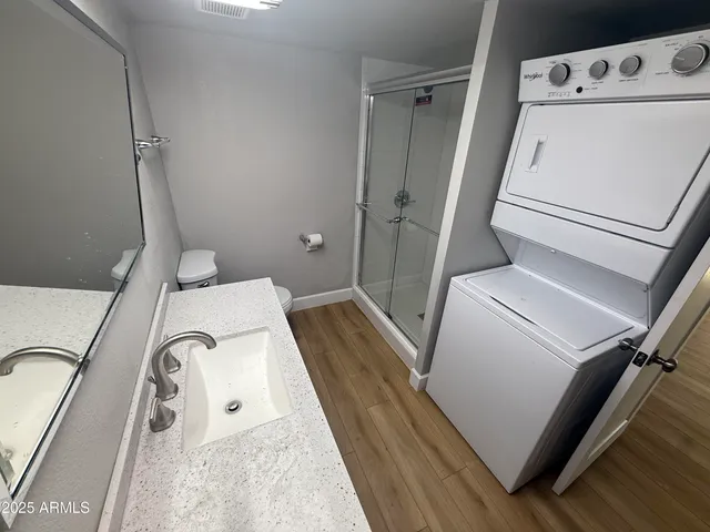 a view of an empty walk in closet