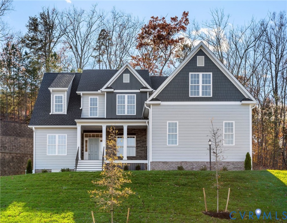 3107 Handley Road Midlothian, VA 23113 - Photo 1 of 50 a front view of a house with a yard