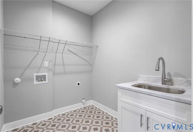 a bathroom with a sink and vanity