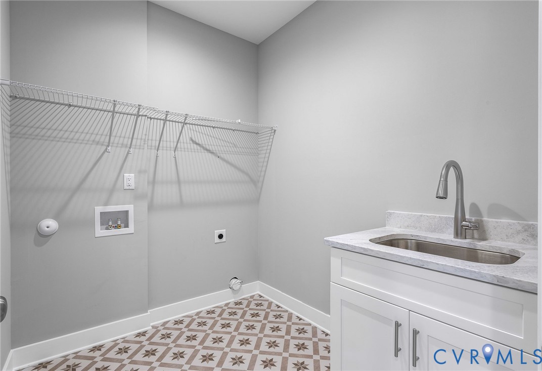 3107 Handley Road Midlothian, VA 23113 - Photo 22 of 50 a bathroom with a sink and vanity