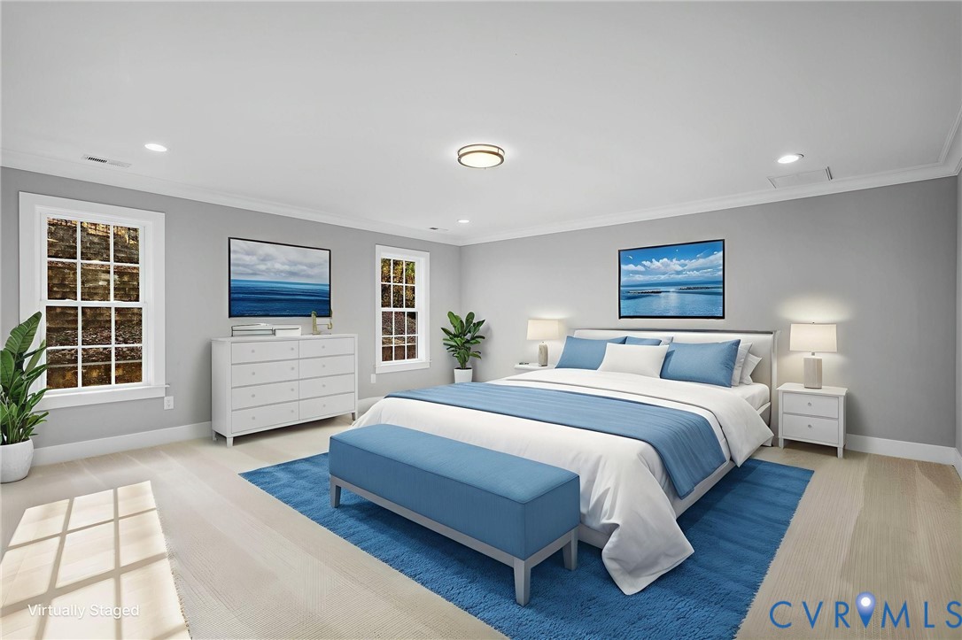 3107 Handley Road Midlothian, VA 23113 - Photo 32 of 50 a spacious bedroom with a large bed a chandelier and windows