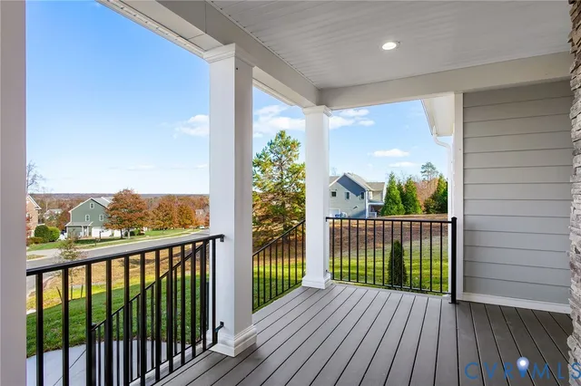 a view of a balcony with wooden floor