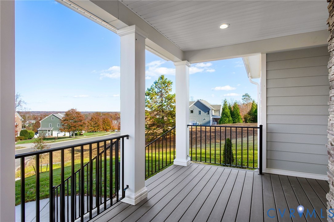 3107 Handley Road Midlothian, VA 23113 - Photo 4 of 50 a view of a balcony with wooden floor