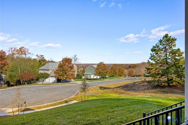 a view of a playground with basketball court
