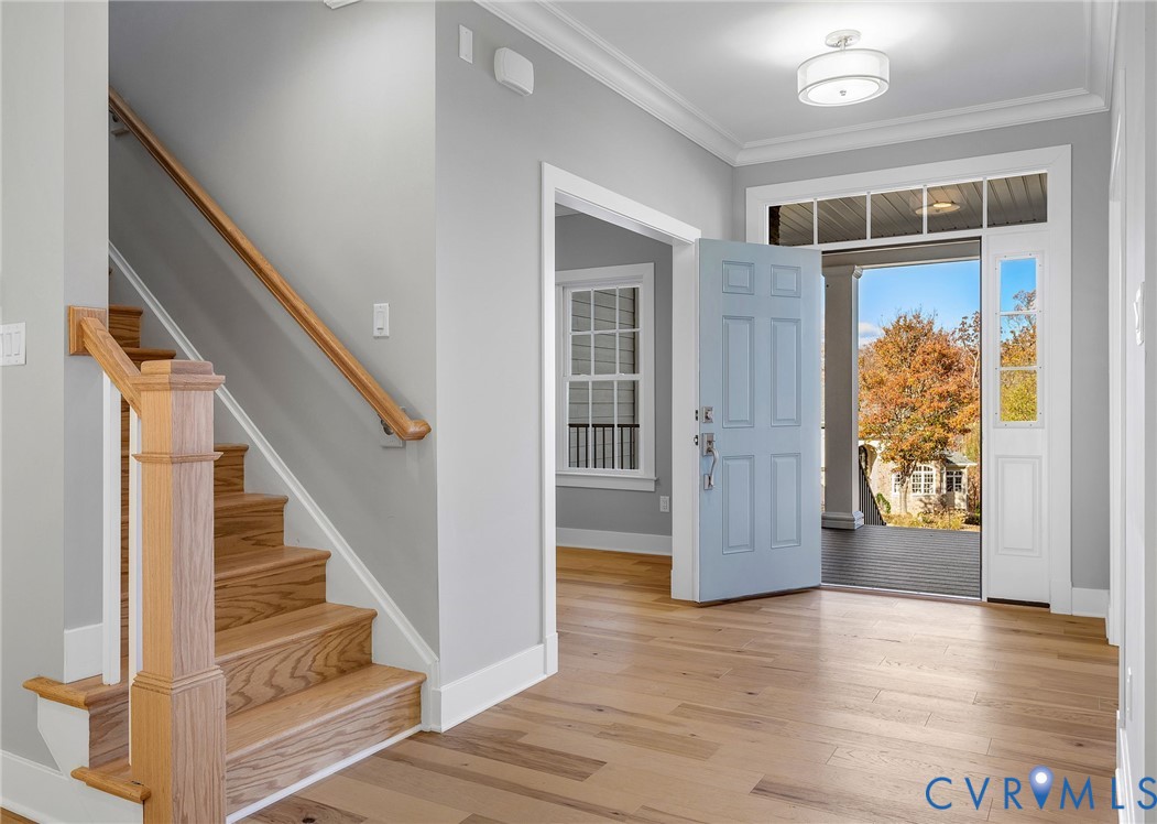 3107 Handley Road Midlothian, VA 23113 - Photo 7 of 50 a view of entryway with wooden floor and stair