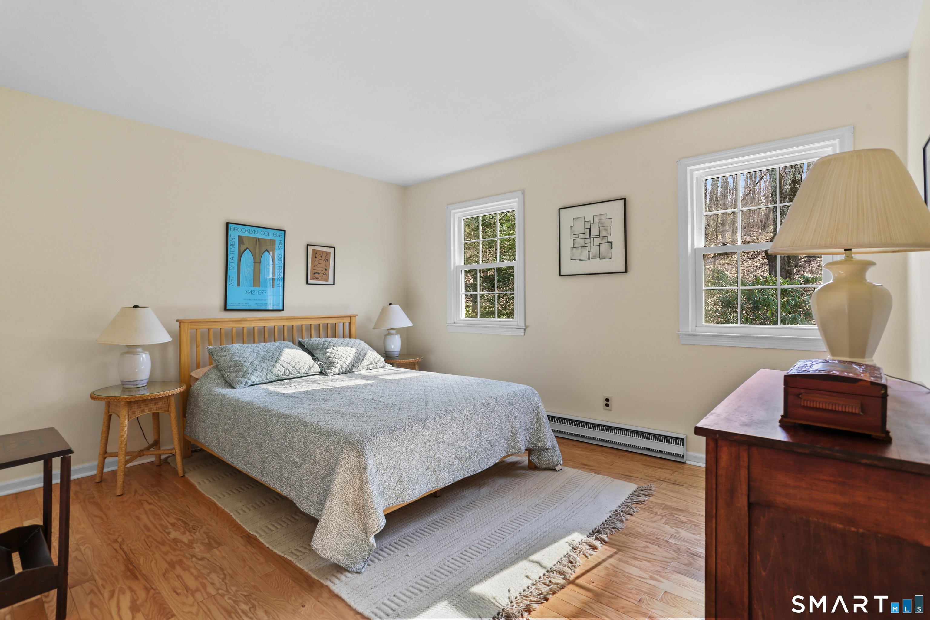 268 Umpawaug Road Redding, CT 06896 - Photo 15 of 28 a bedroom with a large bed and a window