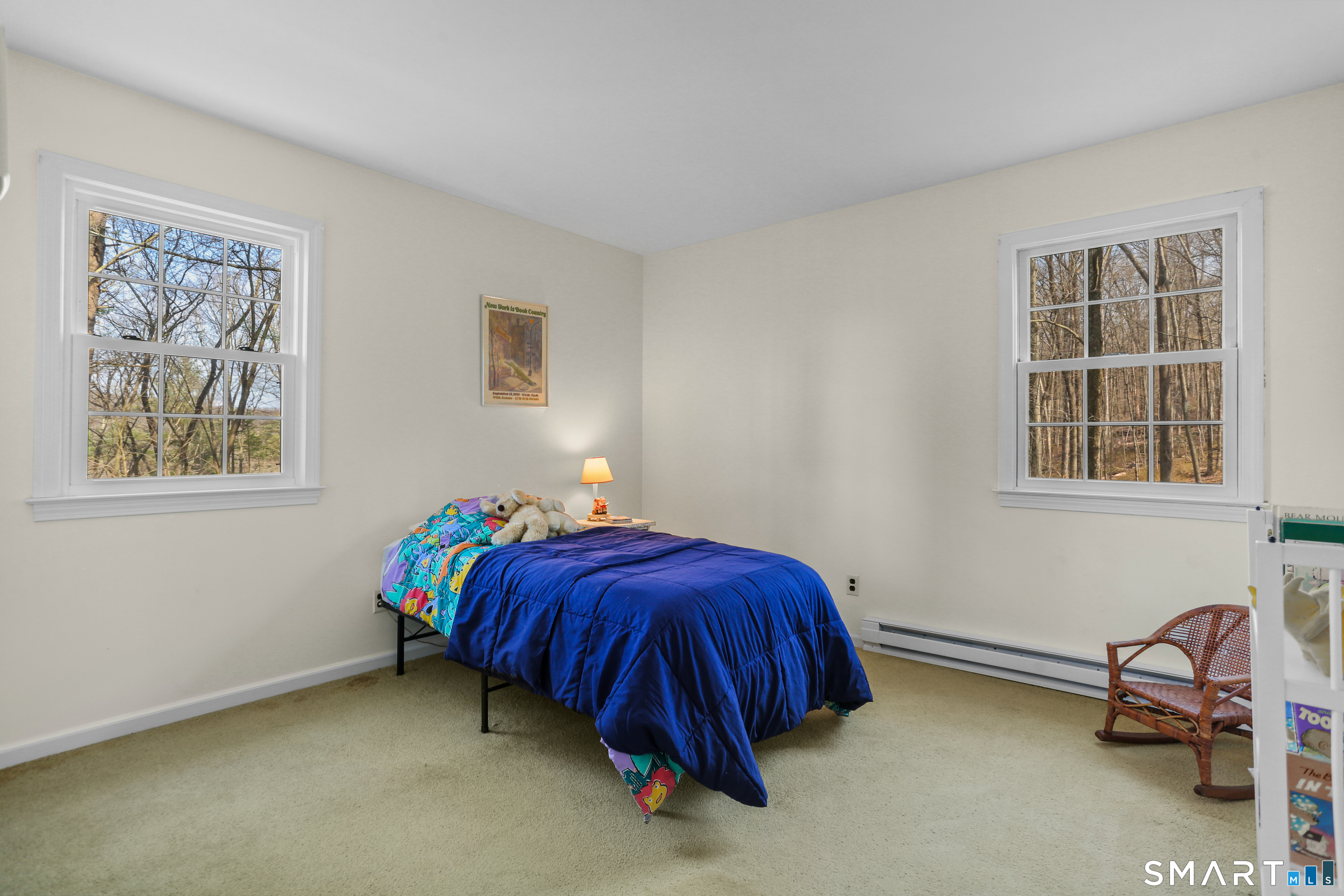 268 Umpawaug Road Redding, CT 06896 - Photo 17 of 28 a bedroom with a bed and a window