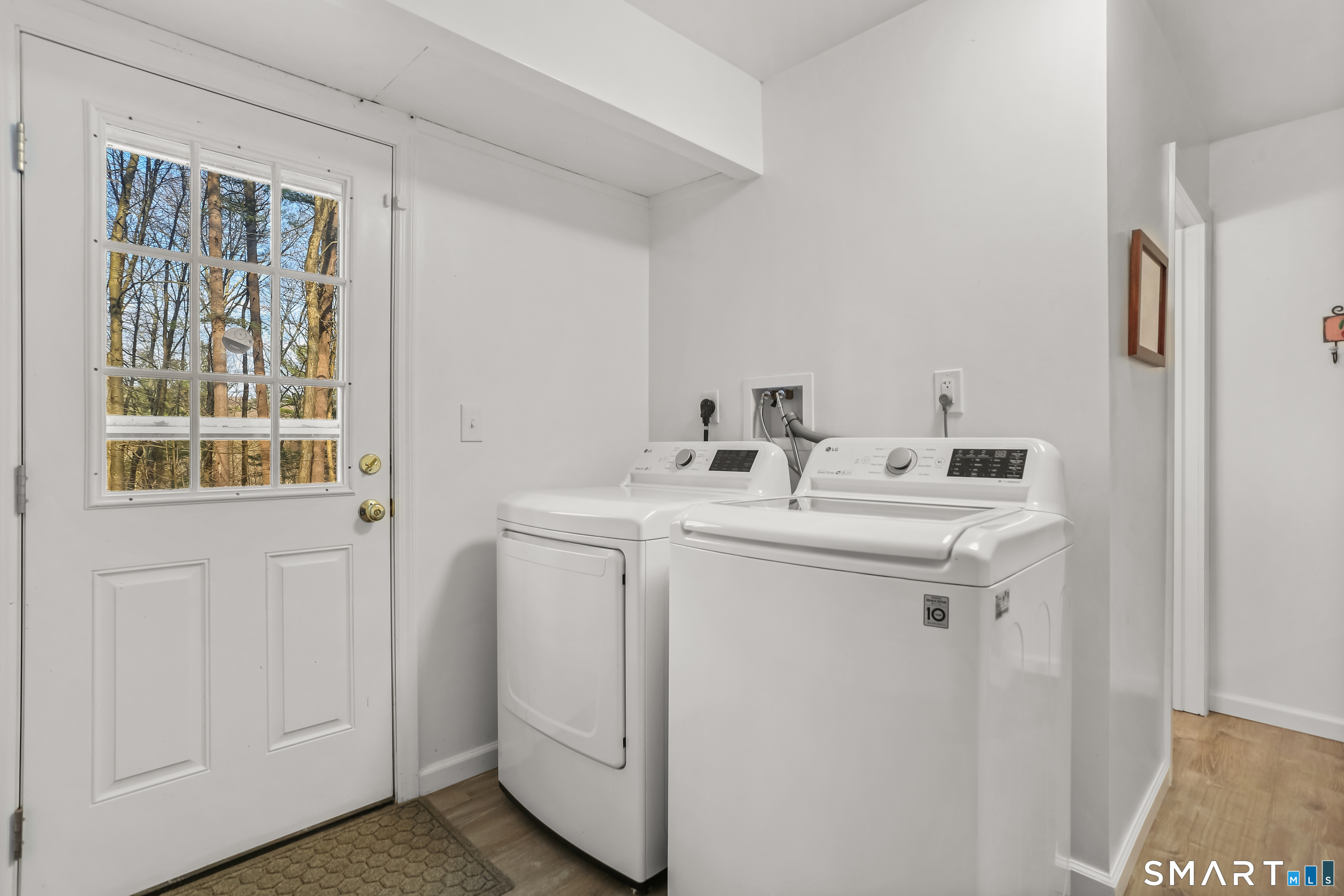 268 Umpawaug Road Redding, CT 06896 - Photo 23 of 28 a utility room with dryer and washer