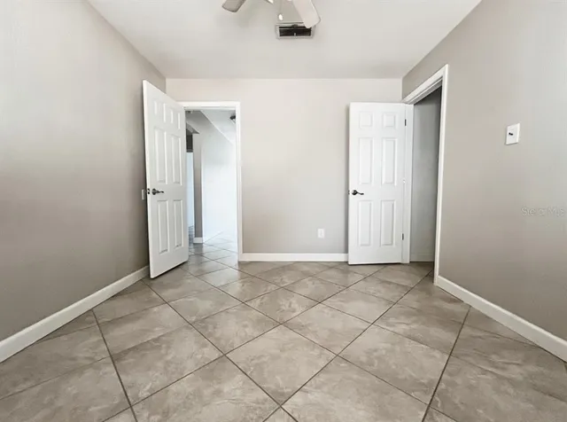 a view of an empty room and window