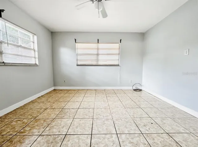 a view of an empty room and window
