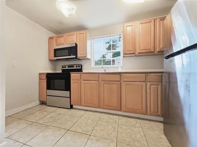 an empty room with window