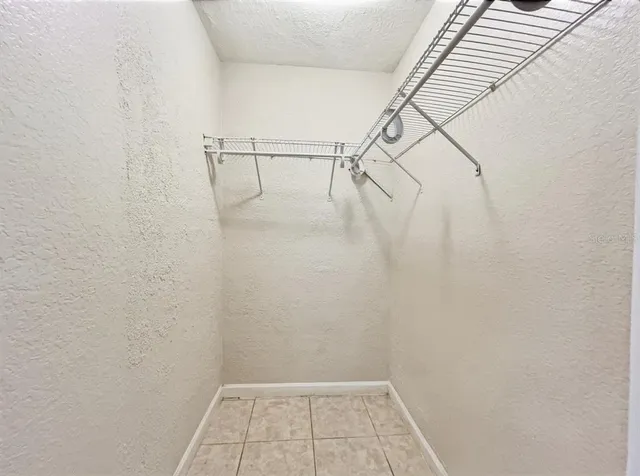 a view of a room with racks on the wall