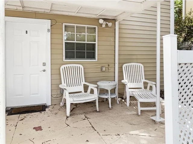 a kitchen with a sink a stove and cabinets
