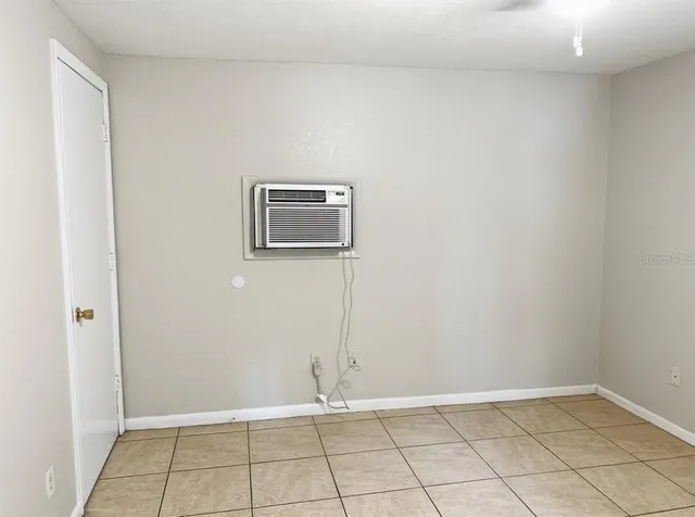 a view of an empty room and window