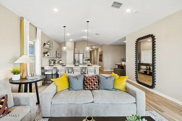 a living room with furniture and window