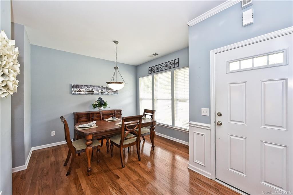 142 Whitley Mills Road Fort Mill, SC 29708 - Photo 2 of 24 a view of a dining room with furniture window and wooden floor