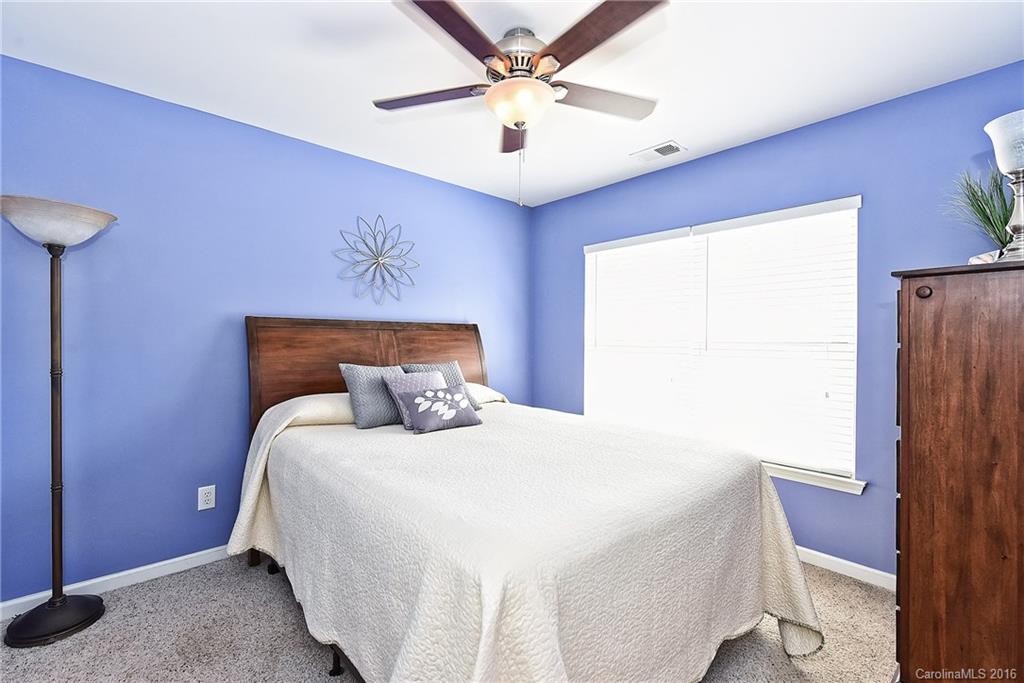 142 Whitley Mills Road Fort Mill, SC 29708 - Photo 14 of 24 a bedroom with a bed and a window