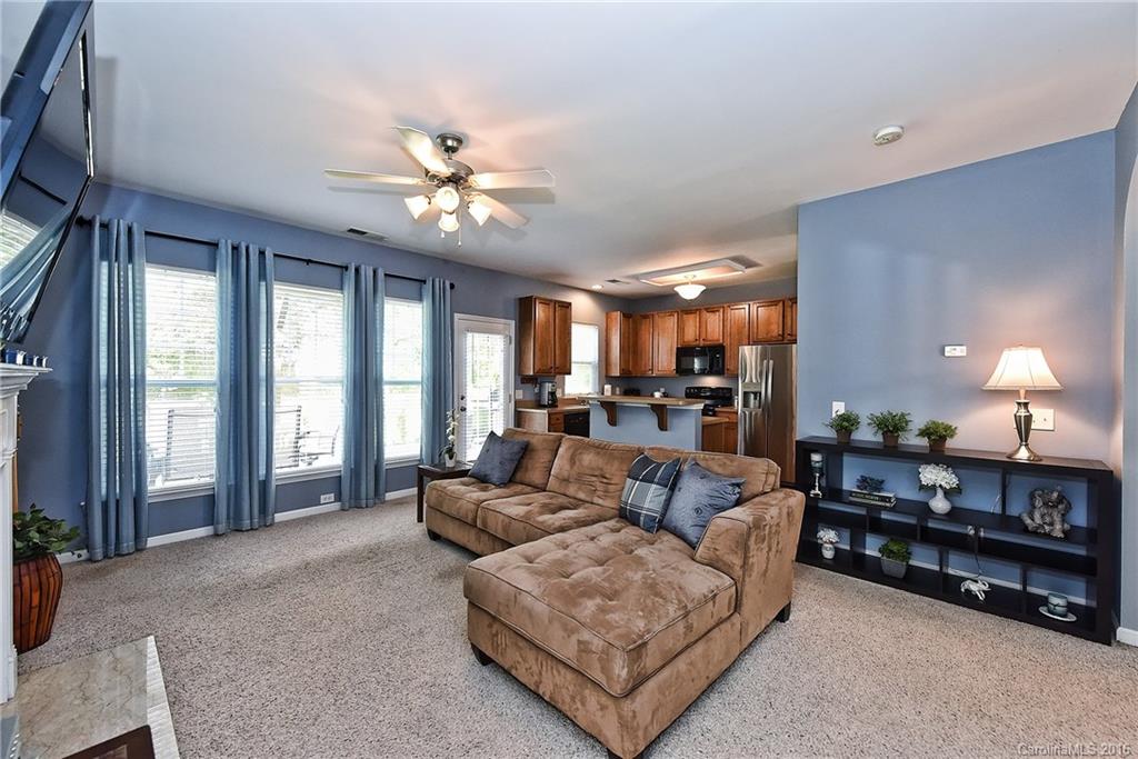 142 Whitley Mills Road Fort Mill, SC 29708 - Photo 6 of 24 a living room with furniture and a large window