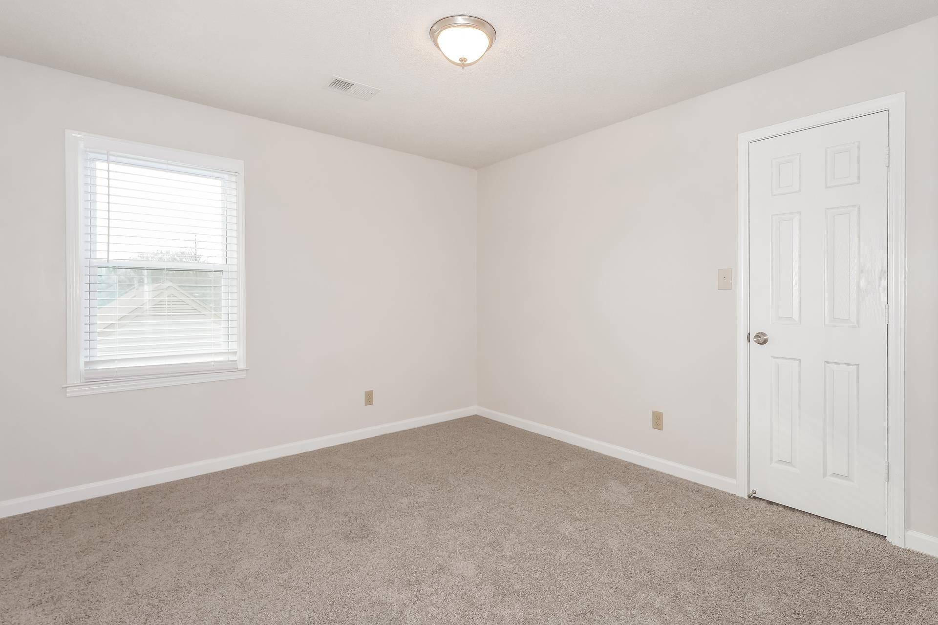 675 South Collierville Arlington Road Collierville, TN 38017 - Photo 10 of 17 Carpeted empty room with baseboards