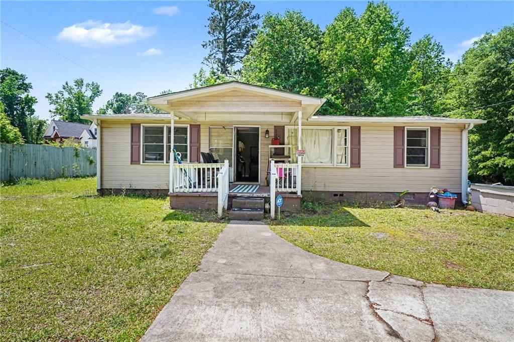137 Taylor Road Jackson, GA 30233 - Photo 1 of 23 a front view of a house with a yard