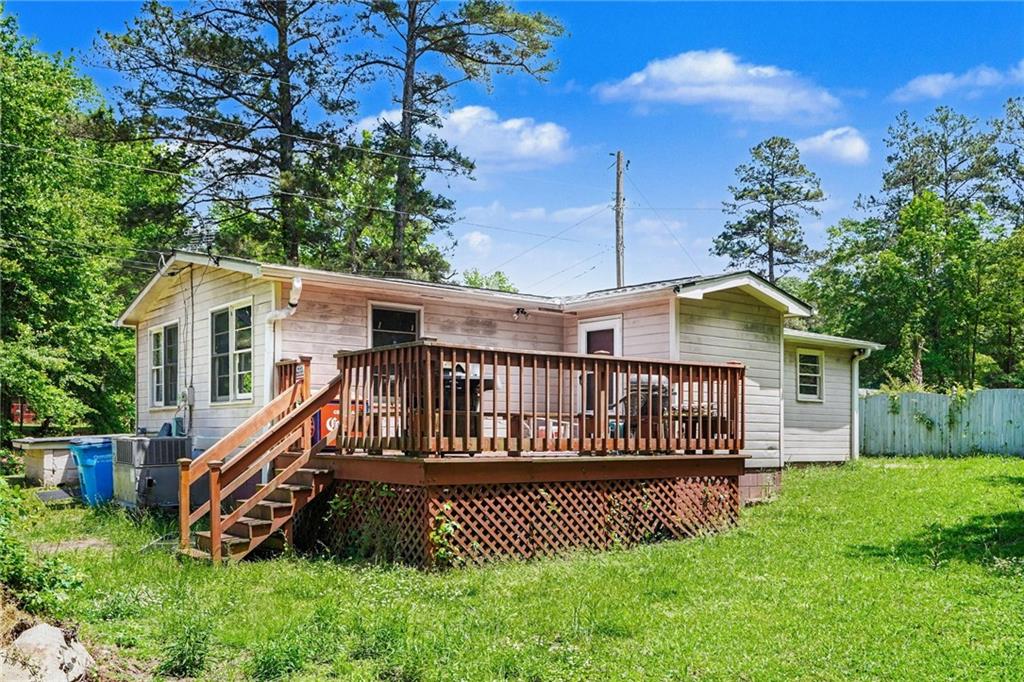 137 Taylor Road Jackson, GA 30233 - Photo 20 of 23 a view of a house with a yard