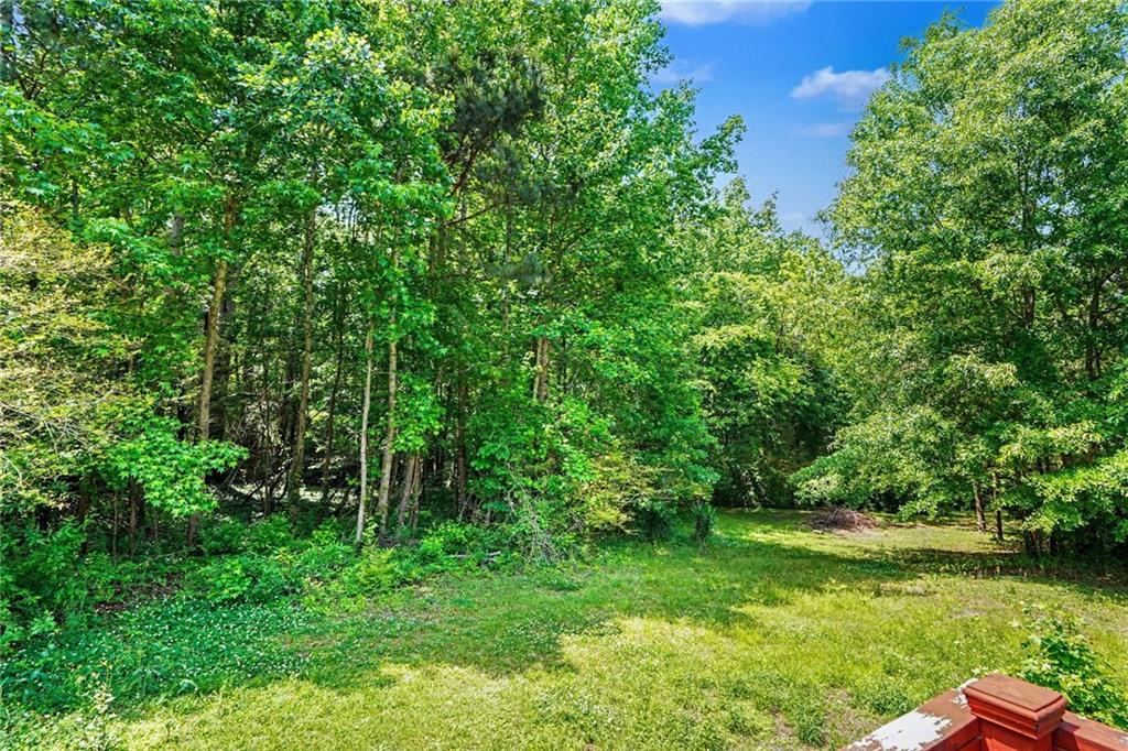 137 Taylor Road Jackson, GA 30233 - Photo 23 of 23 a view of a garden with a lake
