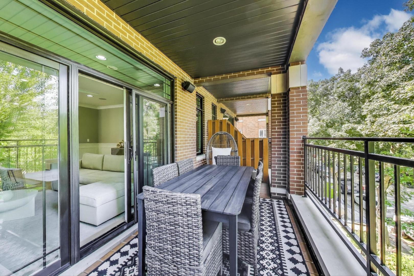 735 West Brompton Avenue, Unit 2E Chicago, IL 60657 - Photo 13 of 25 a view of balcony with wooden floor