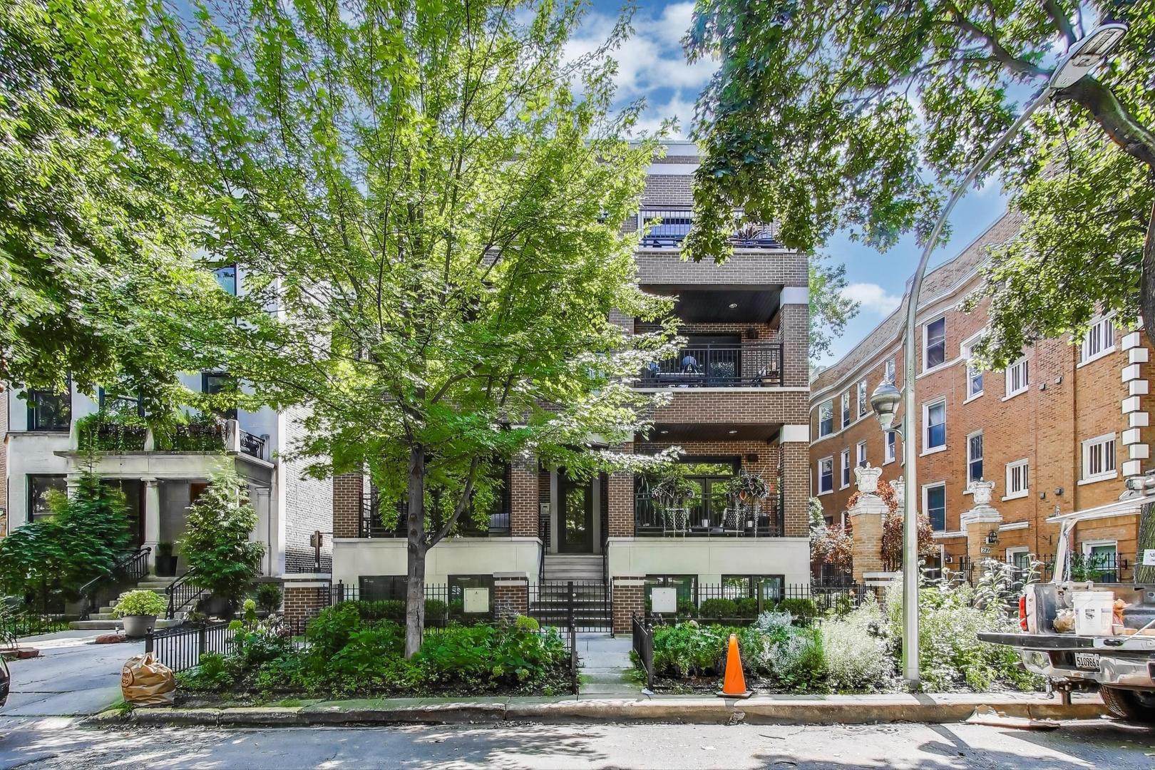 735 West Brompton Avenue, Unit 2E Chicago, IL 60657 - Photo 2 of 25 a view of a building with a garden