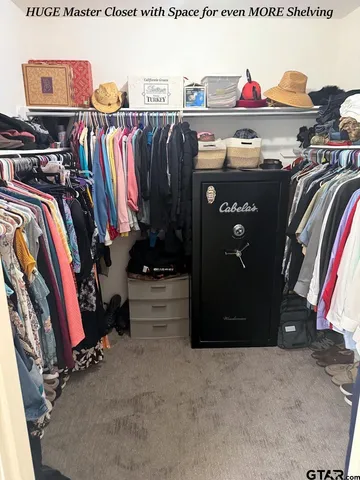 a bedroom with furniture and a couch