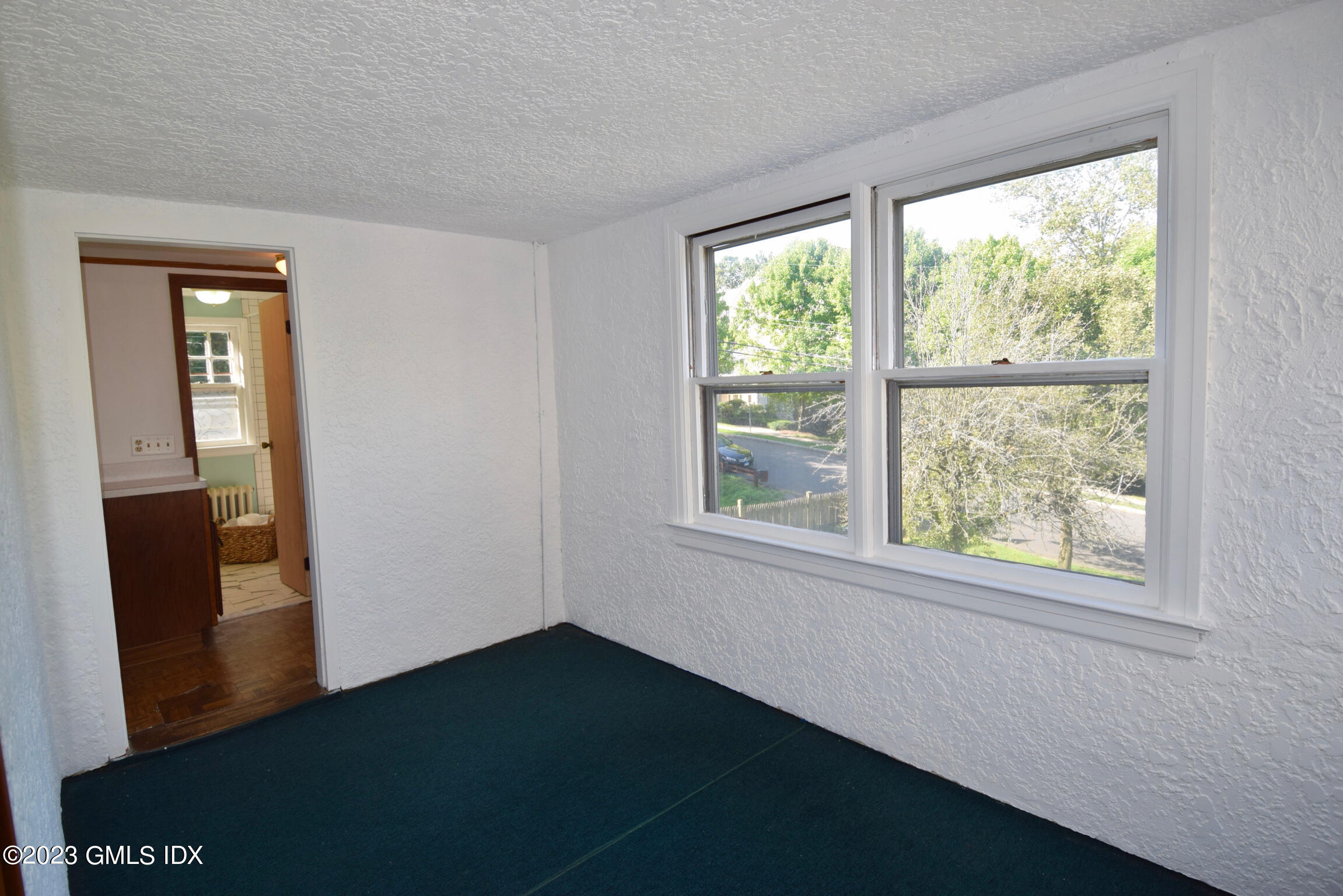 6 Pemberwick Road Greenwich, CT 06831 - Photo 14 of 32 a view of a room that has a window in it