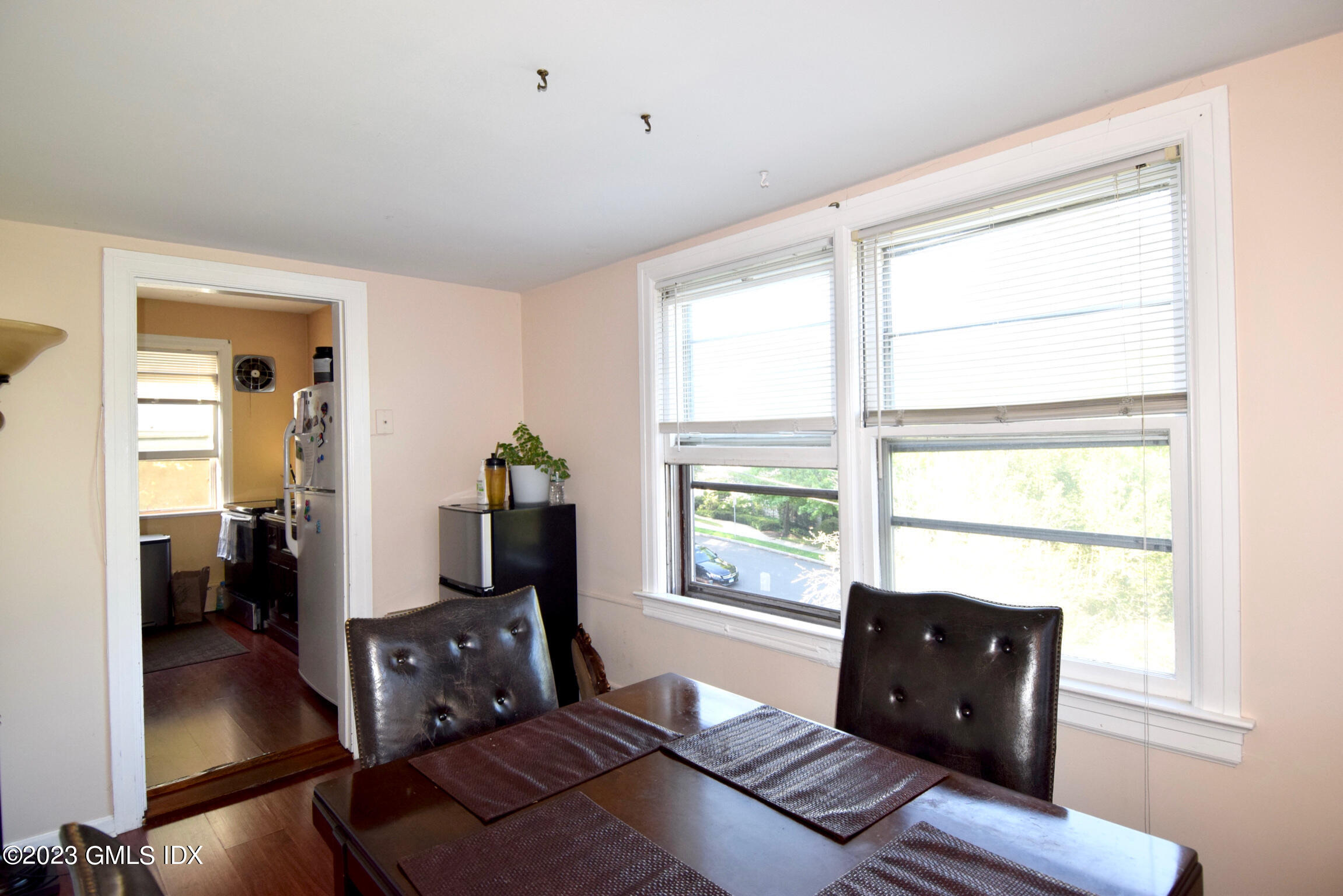 6 Pemberwick Road Greenwich, CT 06831 - Photo 20 of 32 a living room with furniture and a window